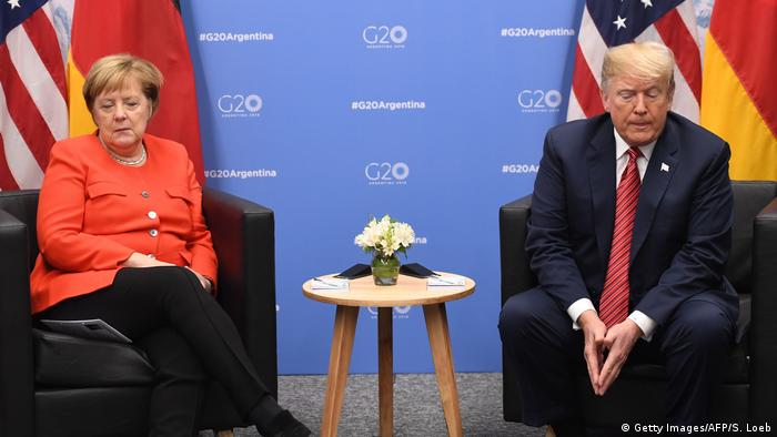 Angela Merkel and Donald Trump on the sidelines of a G-20 summit in 2018