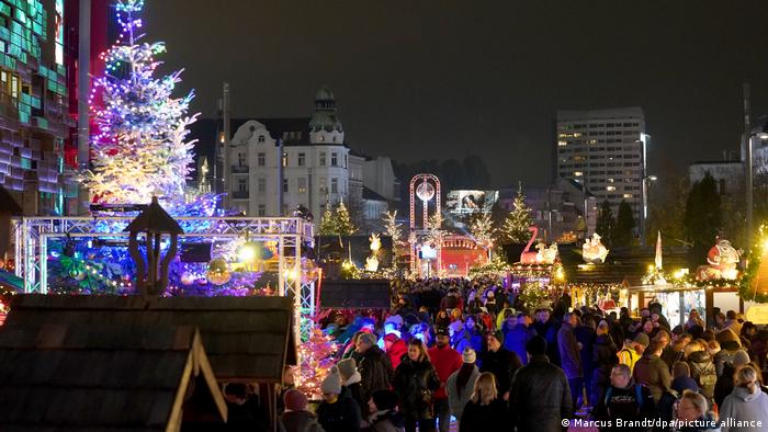 People at the Santa Pauli Christmas market in Hamburg, Germany