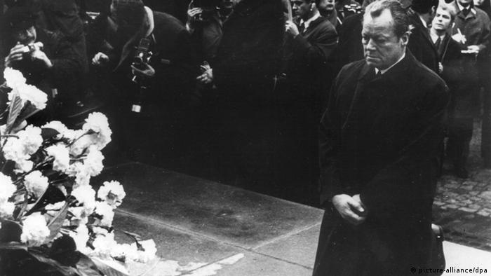 German Chancellor Willy Brandt kneeling at a memorial in the former Warsaw Ghetto to victims of the Nazi regime